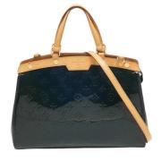 Pre-owned Blatt skinn Louis Vuitton Brea