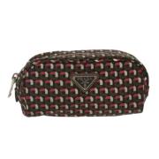 Pre-owned Fabric clutches