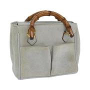 Pre-owned Suede handbags