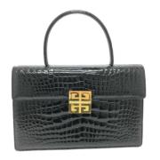 Pre-owned Fabric handbags