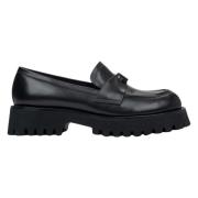 Sorte skinnpennyloafers for kvinner