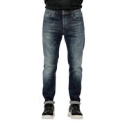 Mørk denim gulrot jeans stretch