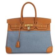 Pre-owned Canvas handbags